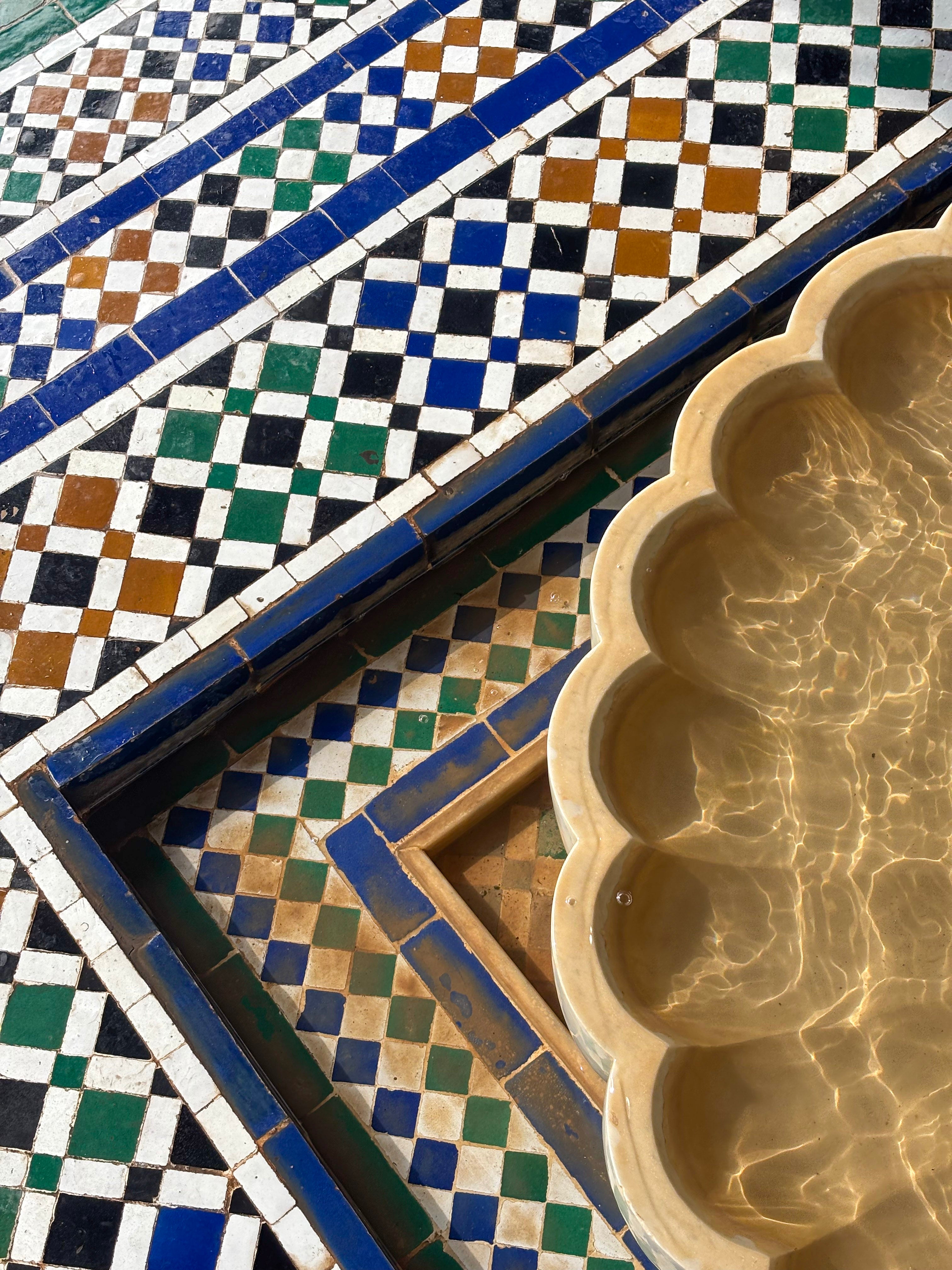 Traditional Moroccan mosaic and fountain